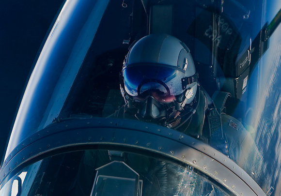I know this is a F-15.  But the reflection in his visor is my KC-135.
